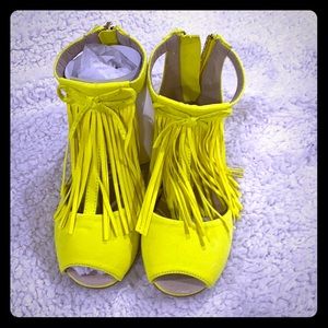 Yellow feet stick out sandals